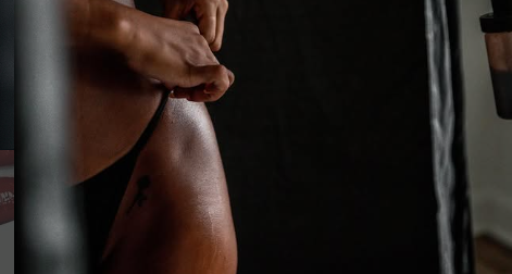 Bride receiving a mobile spray tan from Better Than Revenge before her wedding celebration